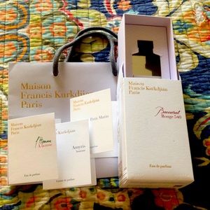 Empty Baccarat Rouge 540 box, samples, and bag.